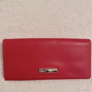 Longchamp dark pink leather wallet